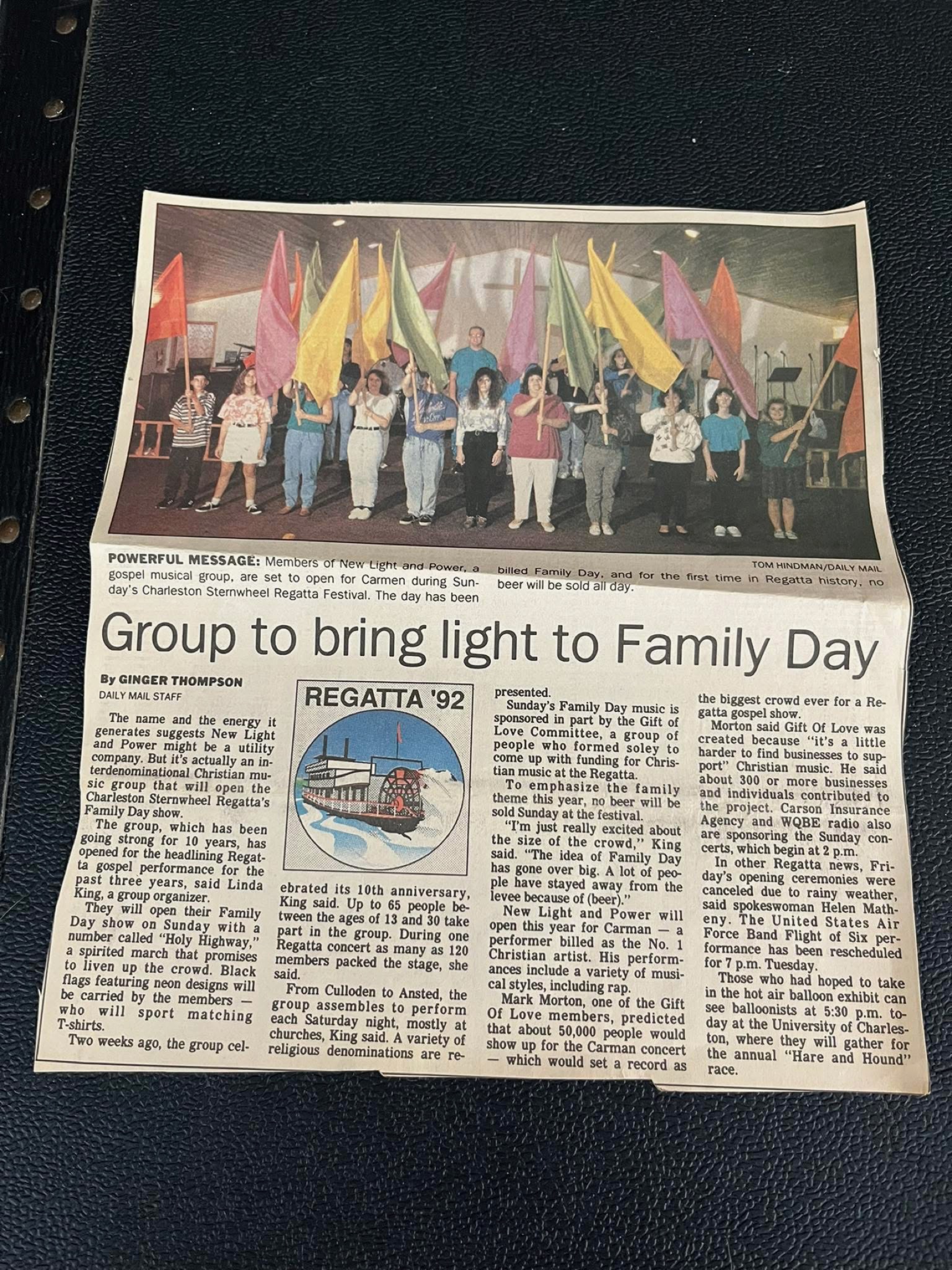 Newspaper article about New Light and Power